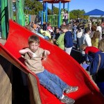 Brendan Sliding down a slide at his accessible playground